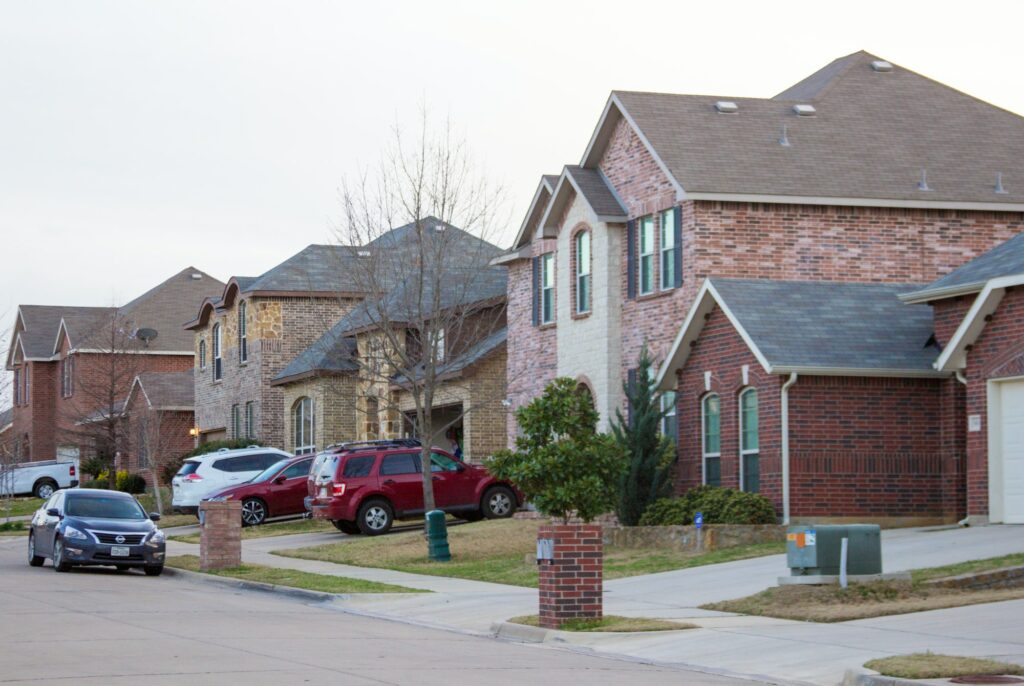 Neighborhood streets and front yard at dusk